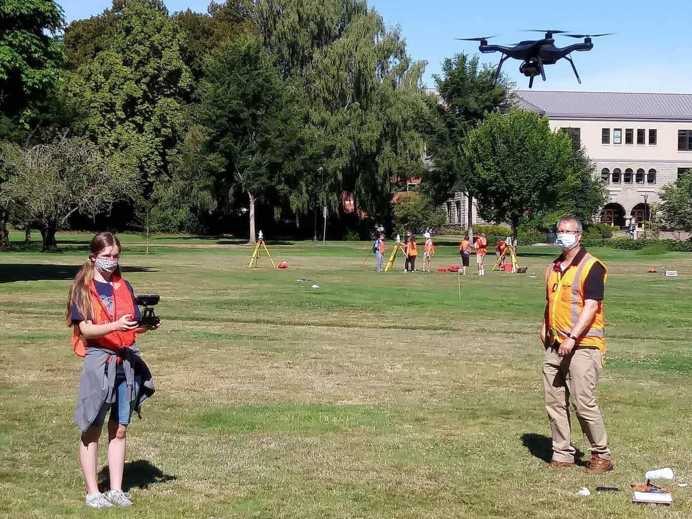 A small camera drone in flight